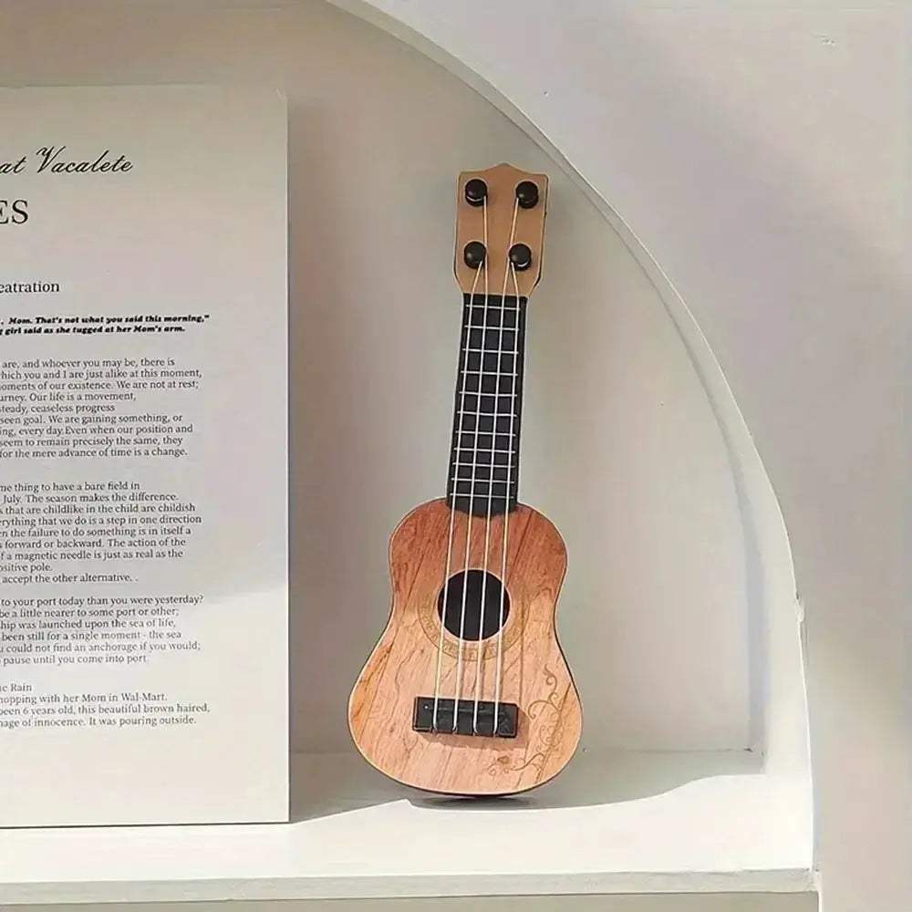 Kids Mini Four String Ukulele Guitar Beginner Friendly Educational Toy - Image 3